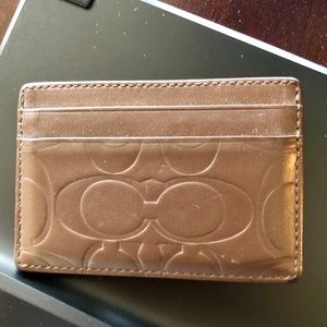 Lightly worn brown leather Coach card holder